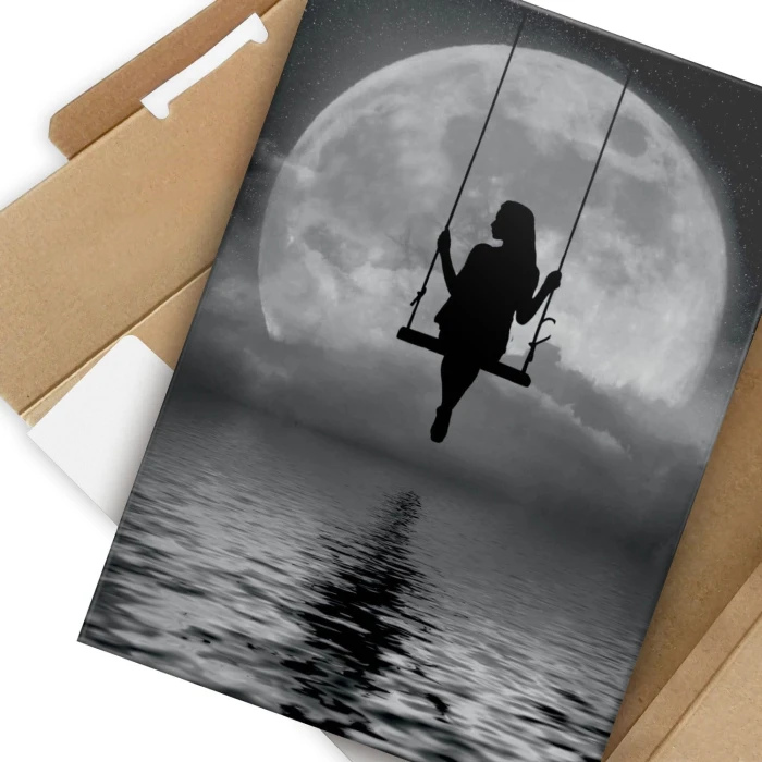 Plakat metalowy Kobieta na huśtawce Prezent