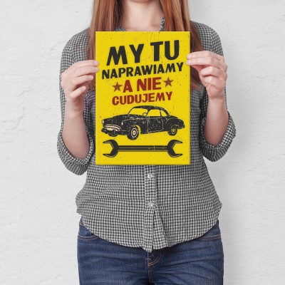 Plakat metalowy MY TU NAPRAWIAMY Prezent